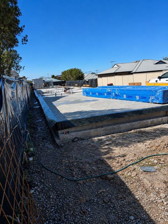 Membrane barrier across a large residential slab